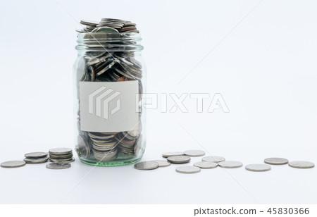 Money saving in the glass bottle for money concept 45830366