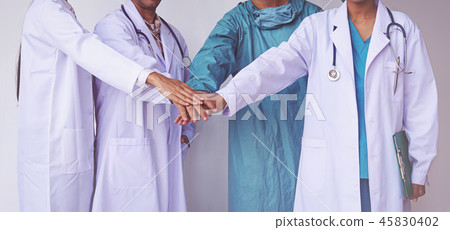 Doctors and Nurses coordinate hands. Doctors and Nurses coordinate hands. 45830402