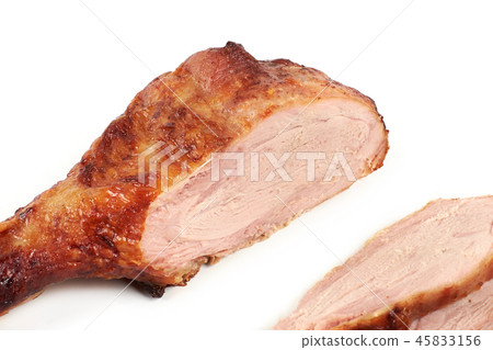 roast turkey leg and sliced turkey meat isolated on white background. roast turkey leg and sliced turkey meat isolated on white background. 45833156