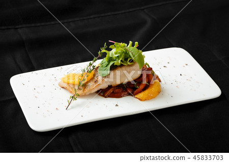 Close up of white fish fillet with vegetable stew Close up of white fish fillet with vegetable stew 45833703