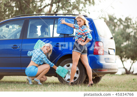 two hot girls wash the car 45834766