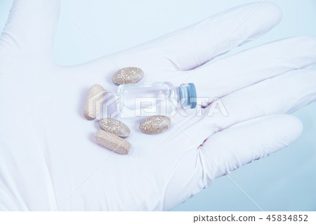 Healthcare, Healthcare, Healthcare Hospital Institute Photographs, Concepts of hand holding bottle capsules 45834852