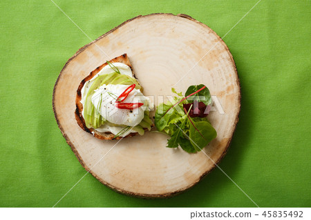 Appetizing sandwich with avocado and egg 45835492