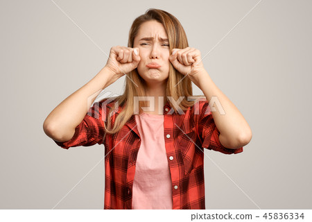 Frustrated woman crying, having a temper tantrum Frustrated woman crying, having a temper tantrum 45836334