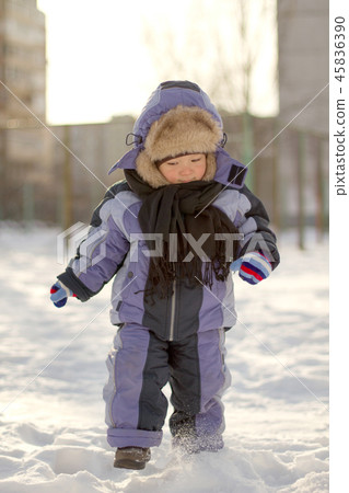 Boy enjoying the first snow Boy enjoying the first snow 45836390