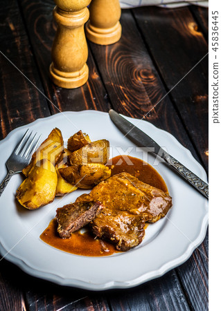 Grilled pork steak and fried potatoes 45836445