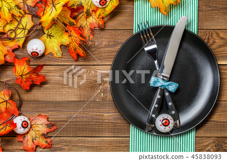 Wooden Halloween table with eyes, fork Wooden Halloween table with eyes, fork 45838093
