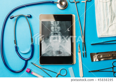 Surgical tool on blue table Surgical tool on blue table 45838195