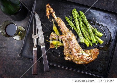 Barbecue Leg of Lamb with green Asparagus as top v 45844062