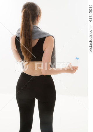 Young woman exercising Young woman exercising 45845053