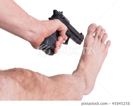 Man shooting himself in the foot 45845258