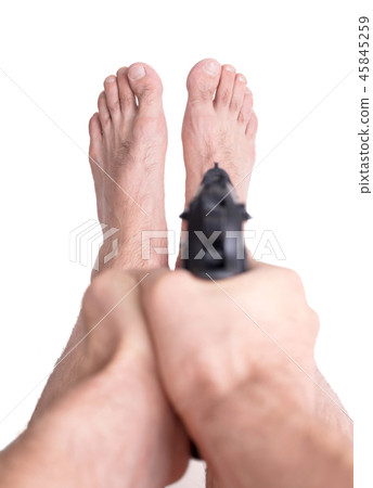 Man shooting himself in the foot Man shooting himself in the foot 45845259