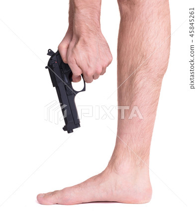 Man shooting himself in the foot 45845261