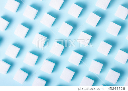 Sugar on blue background Sugar on blue background 45845526