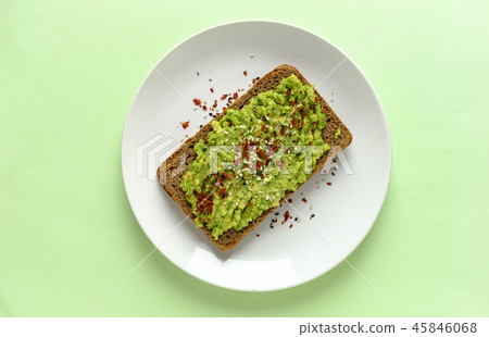Smashed avocado toast with chilli and copy space 45846068