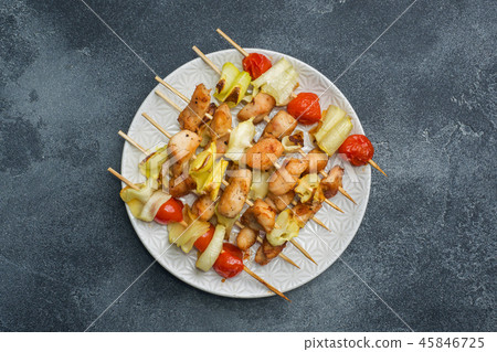 Kebab chicken, zucchini and tomatoes on skewers Kebab chicken, zucchini and tomatoes on skewers 45846725