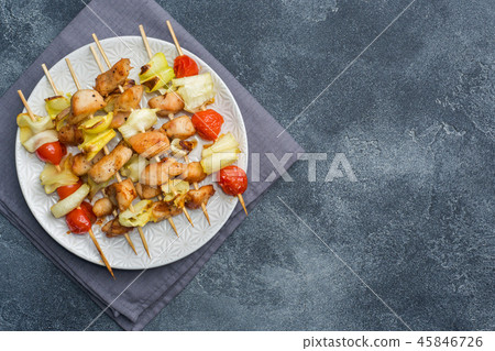 Kebab chicken, zucchini and tomatoes on skewers Kebab chicken, zucchini and tomatoes on skewers 45846726