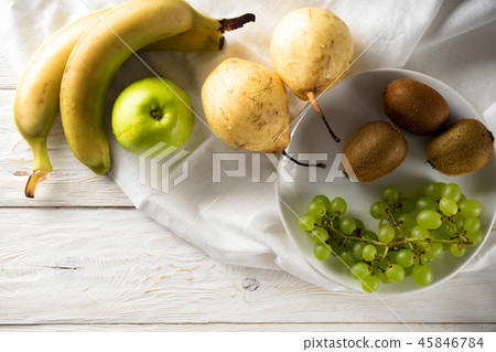 Ingredients for fruit salad are on the table 45846784