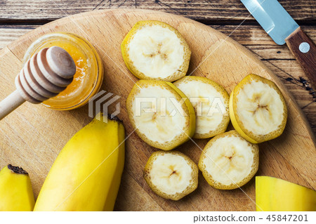 Banana and sliced banana into pieces with honey 45847201