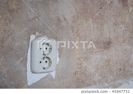old electric plug socket closeup on vintage wall old electric plug socket closeup on vintage wall 45847752
