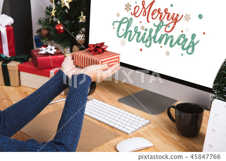 Businesswoman hand holding gift box in christmas 45847766