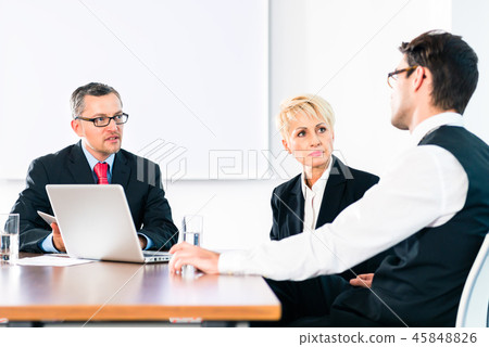 Business people having conversations in office 45848826