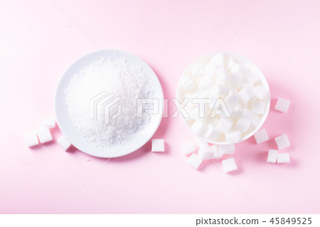 Sugar on pink background Sugar on pink background 45849525