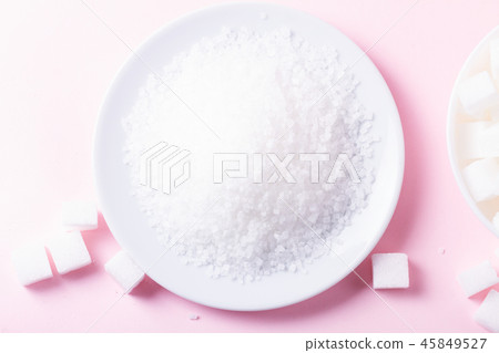 Sugar on pink background Sugar on pink background 45849527