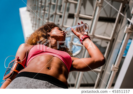 Low angle of a beautiful fit young woman 45851157