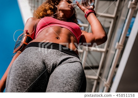Low angle of a sportive active woman 45851158