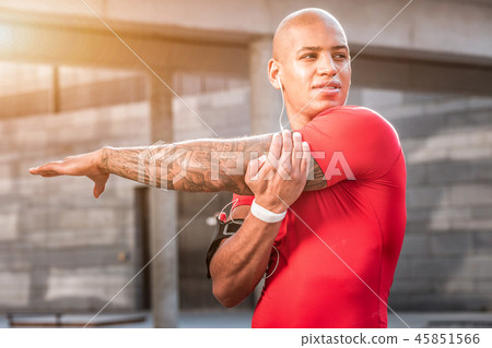 Attractive nice young man developing his muscles 45851566