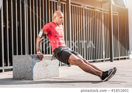 Pleasant nice young man enjoying his training 45851601