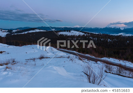 Evening twilight winter mountain ridge panorama 45851683