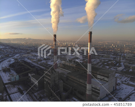 Aerial view of smoke rising from the chimney of a coal boiler. HDR photo. Aerial view of smoke rising from the chimney of a coal boiler. HDR photo. 45851789