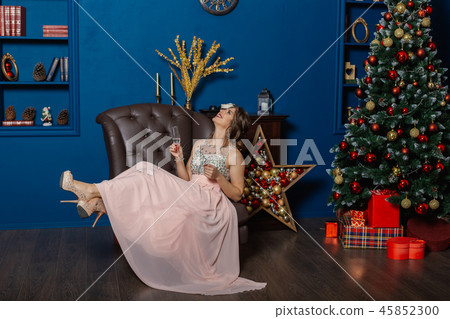 Very beautiful woman drinking champagne in new 45852300