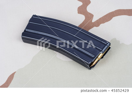 M16 rifle magazine with cartridges on uniform  45852429