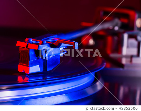 Vintage photo of Old Gramophone, playing a music. Neon light. Cinemagraph, retro record vinyl player Vintage photo of Old Gramophone, playing a music. Neon light. Cinemagraph, retro record vinyl player 45852506