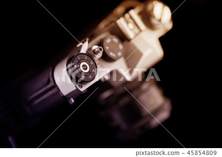 Old analog camera in black and silver tones 45854809