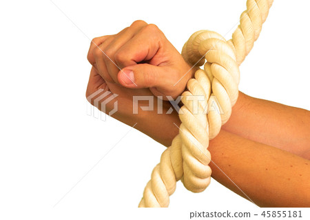 Men's hands are tied in ropes and clenched in their fists. Men's hands are tied in ropes and clenched in their fists. 45855181