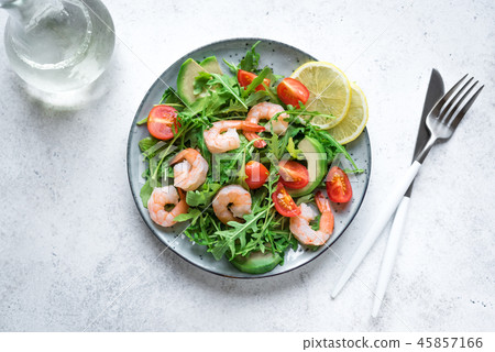 Shrimp avocado arugula salad 45857166