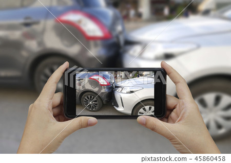 hand holding smartphone and take photo hand holding smartphone and take photo 45860458