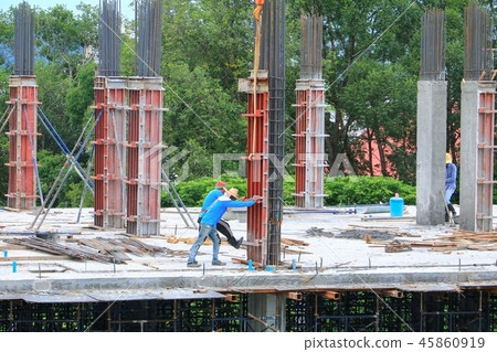 labor working and Crane hook in big construction  45860919