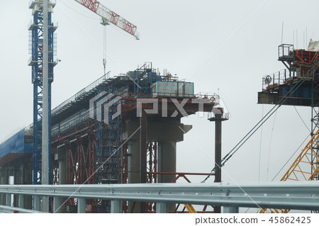 Kerch Bridge under construction in a rainy day Kerch Bridge under construction in a rainy day 45862425