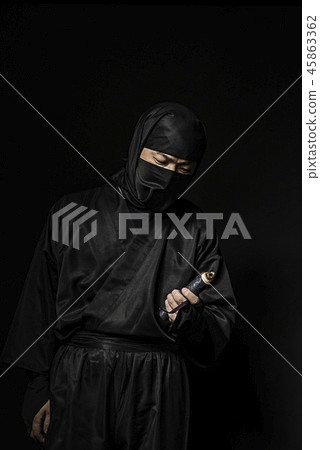 Ninja holding a scroll 45863362