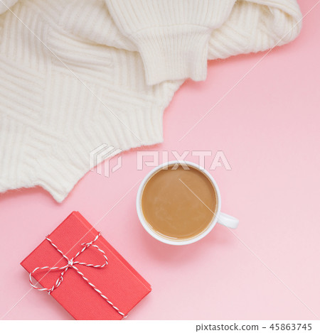coffee sweater and red present pink background coffee sweater and red present pink background 45863745