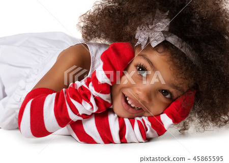 Portrait of a preschool child girl laying down Portrait of a preschool child girl laying down 45865595