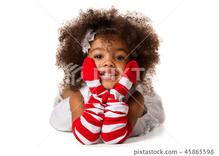 Portrait of a preschool child girl laying down Portrait of a preschool child girl laying down 45865598