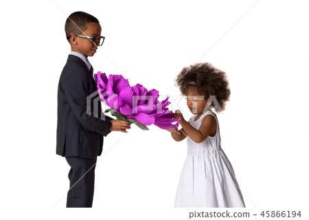 Handsome boy gives a cute girl big origami flower Handsome boy gives a cute girl big origami flower 45866194