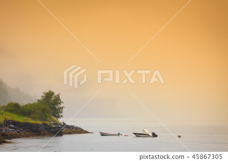 Little boat on water surface 45867305