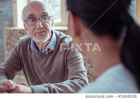 Upset retirement spending his free time in social home 45868038